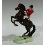 A Beswick Huntsman on a rearing horse