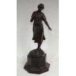 A 19th century Art Nouveau bronzed figure of a young girl