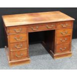 An early 20th century mahogany twin pedestal writing desk,
