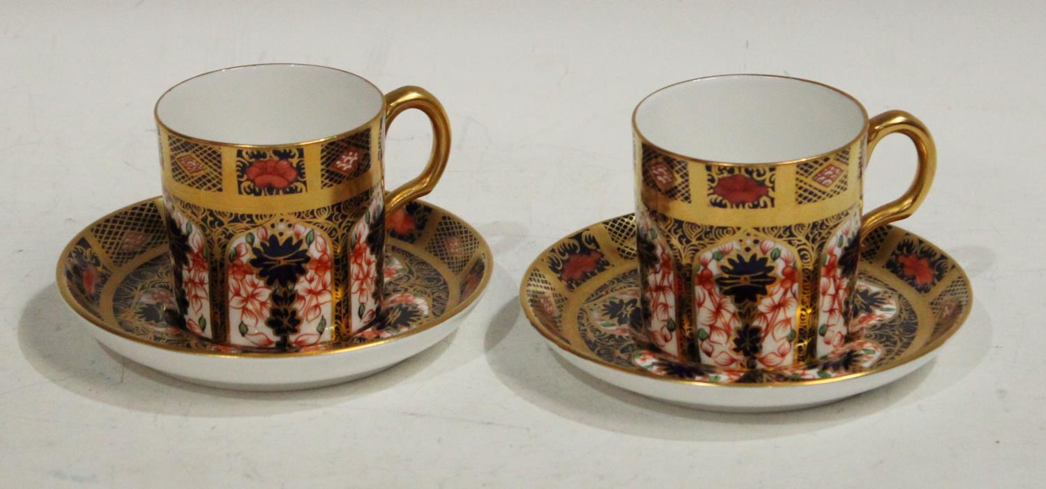 A pair of Royal Crown Derby Imari palette 1128 pattern coffe cans and saucers,