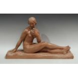After Bargas, a French Art Deco style model of a resting nude,