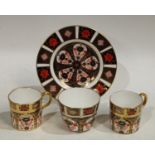 A Royal Crown Derby Imari palette 1128 pattern teacup, pair of coffee cans, tea plate,