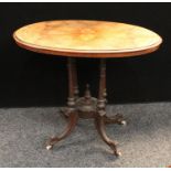 A Victorian walnut and marquetry oval centre table, 90.