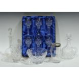 A set of six Tutbury crystal cut glass wine glasses, boxed; a cut glass decanter,