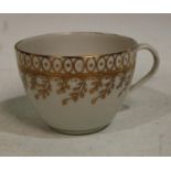 A Pinxton Bute-shaped teacup, pattern no.353, 6cm high, the base numbered 353 in gilt, c.