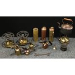 Metalware - a Gilbert J McCaul and Co brass paraffin stove; another similar,