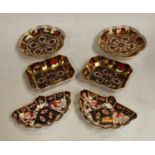 A Pair of Royal Crown Derby Imari palette 1128 pattern pin trays, solid gold bands,