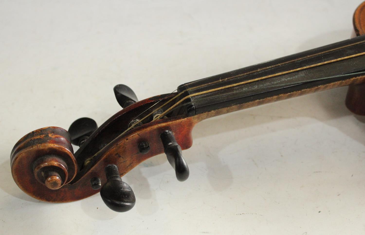 A late 19th/ early 20th century Stradivarius copy violin, two piece back, double line purfling, - Image 5 of 5