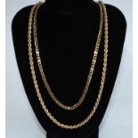 A 9ct gold fancy link necklace, 13.7g; another 9ct gold rope twist necklace, 7.