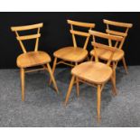A set of four Ercol 'Green Dot' stacking chairs (4)