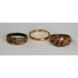 A 22ct gold wedding band, 2.7g; a 9ct gold rose gold ring, 4.6g; another set with seed pearls, 2.