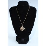 A 9ct gold locket on neckchain