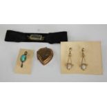 Jewellery - a pair of earrings; a Georgian moire silk bracelet; a heart shaped locket;