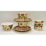 Royal Crown Derby 1128 pattern - two teacups, saucers and teaplates; sugar bowl; milk jug.