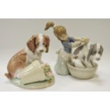 A Lladro figure, of a girl bathing a dog, printed and impressed marks to base, pattern number 5455,