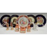 A pair of continental porcelain cabinet plates, printed with of portraits of beautiful ladies,