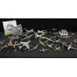 An Atlas Editions collector's model plane on stand; others similar,