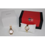 A Tissot stainless steel gold plated lady's waristwatch, mother of pearl dial, baton indicators,