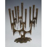 A brass Jewish Menorah candlestick,