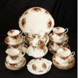 A Royal Albert Old Country Roses pattern teapot, milk and sugar, cups and saucers, plates,