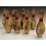 A set of eight vintage hardwood Brunswick bowling pins, 50 Score King, Nylon reinforced,