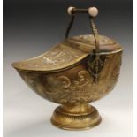 A 19th century brass coal scuttle