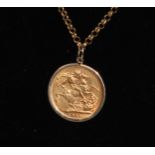 A George V gold full sovereign, 1914, mounted in a 9ct pendant with necklace chain,