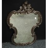 A Rococo style cartouche shaped looking glass