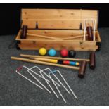 A mid-late 20th century croquet set,
