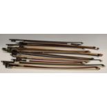A collection of violin bows (16)