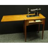 A Singer electric sewing machine, EJ435384,