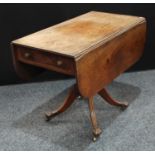 A George III Regency mahogany Pembroke table, rectangular top with reeded edge and fall leaves,