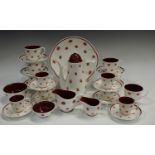 A Susie Cooper One O'Clocks pattern tea set, printed with dandelions in red on a white groound,