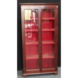 An early 20th century mahogany bookcase/display cabinet,