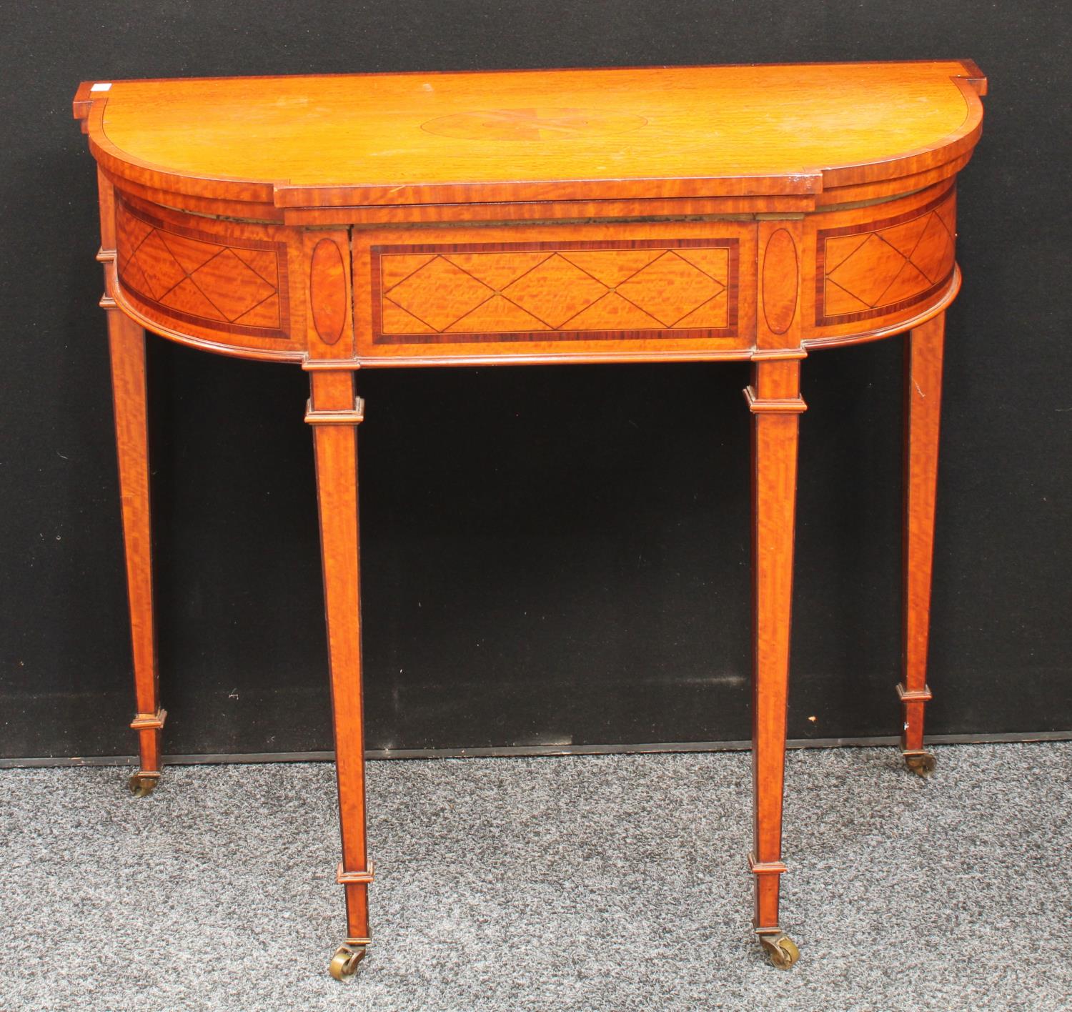 A Sheraton Revival design satinwood card table,
