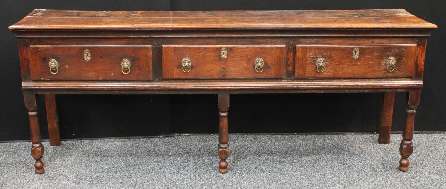 A George III oak low dresser/serving table,