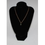 A South Sea Islands grey cultured pearl diamond accented pendant necklace, 9ct gold fine link chain,