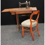 An early 20th century Singer sewing machine,