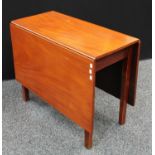 A 19th century mahogany rectangular dropleaf table