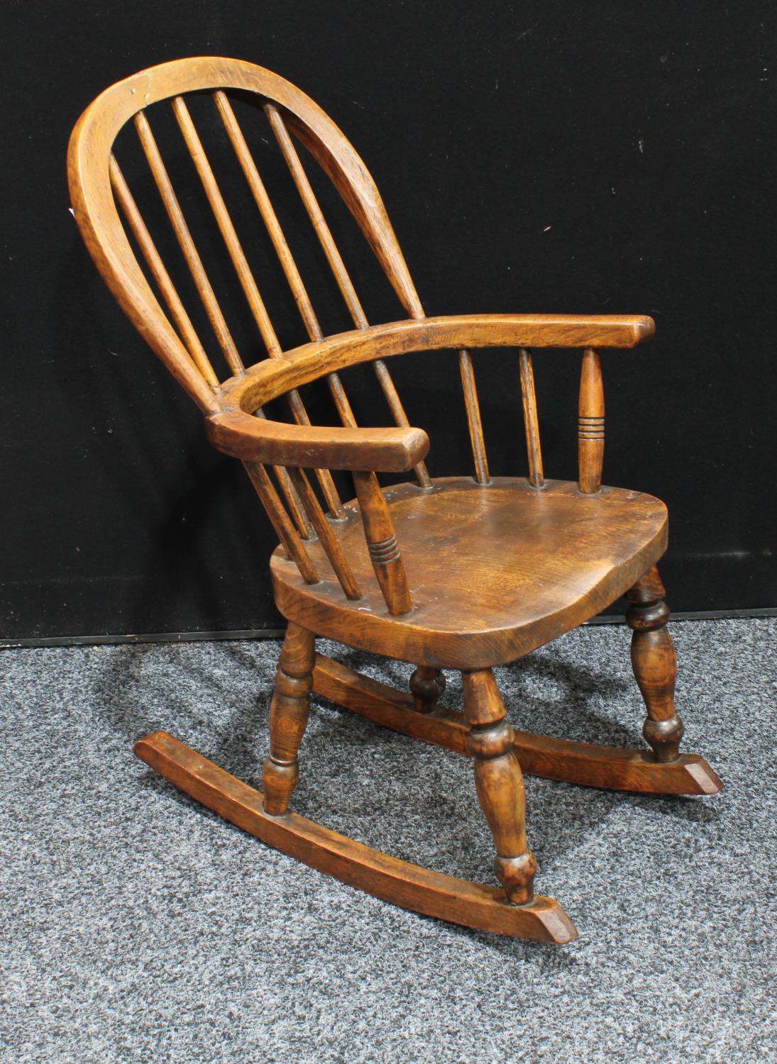 A Country House child's Windsor rocking chair, hoop back, bowed mid-rail, saddle seat, - Image 3 of 4