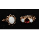 Rings - an opal and garnet trilogy ring, 9ct gold shank, an opal dress ring, 9ct gold shank, 5.