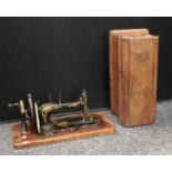 A late 19th/early 20th century Jones Family hand-crank sewing machine