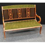 An Edwardian mahogany chair back design sofa,