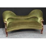 A Victorian mahogany framed sofa or double day bed, scroll hand rests, incurve seat,