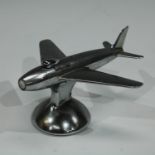 A Dunhill chrome cigarette lighter, modelled as an aeroplane, 16cm wide,
