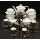 An eggshell coffee set in black and gold,