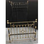 A Victorian cast metal and brass 'half tester' bed