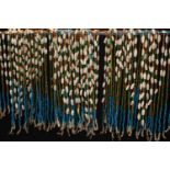 A late 19th century Indian bead and shell door curtain,