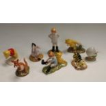 A set of Royal Doulton Disney's Winnie the Pooh figures, Pooh and Piglet The Windy Day,