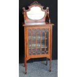 An early 20th century mahogany music room cabinet,